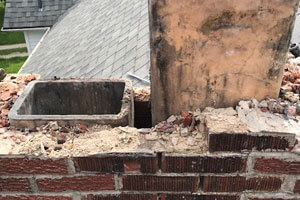 Construction on brick chimney