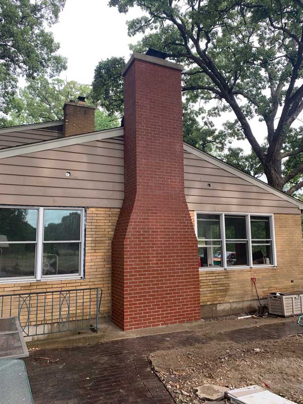 New masonry siding chimney